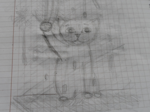 Котёнок за окошком