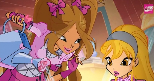 Флора показывает Стелле как обращаться с цветком