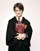 Гарри Поттер с учебником