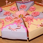 Оригинальная упаковка для маленьких конфет и подарков в виде торта